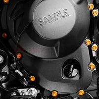 CNC race spec M6 bolts for Triumph Daytona 660 crankcase cover, black finish, installation on motorcycle engine.