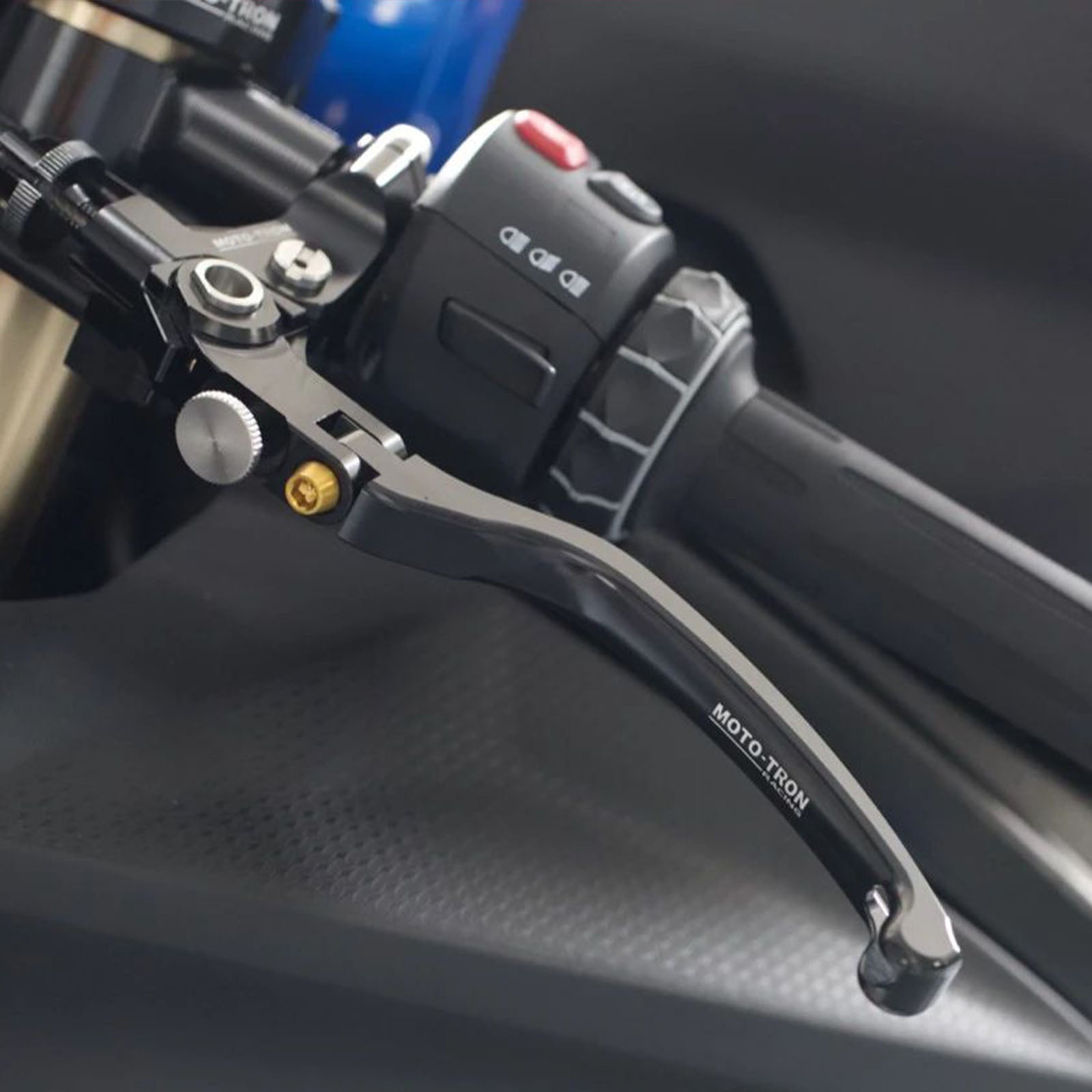 Moto-Tron lightweight racing folding clutch lever installed on Aprilia GPR150 GPR250 motorcycle, close-up view.