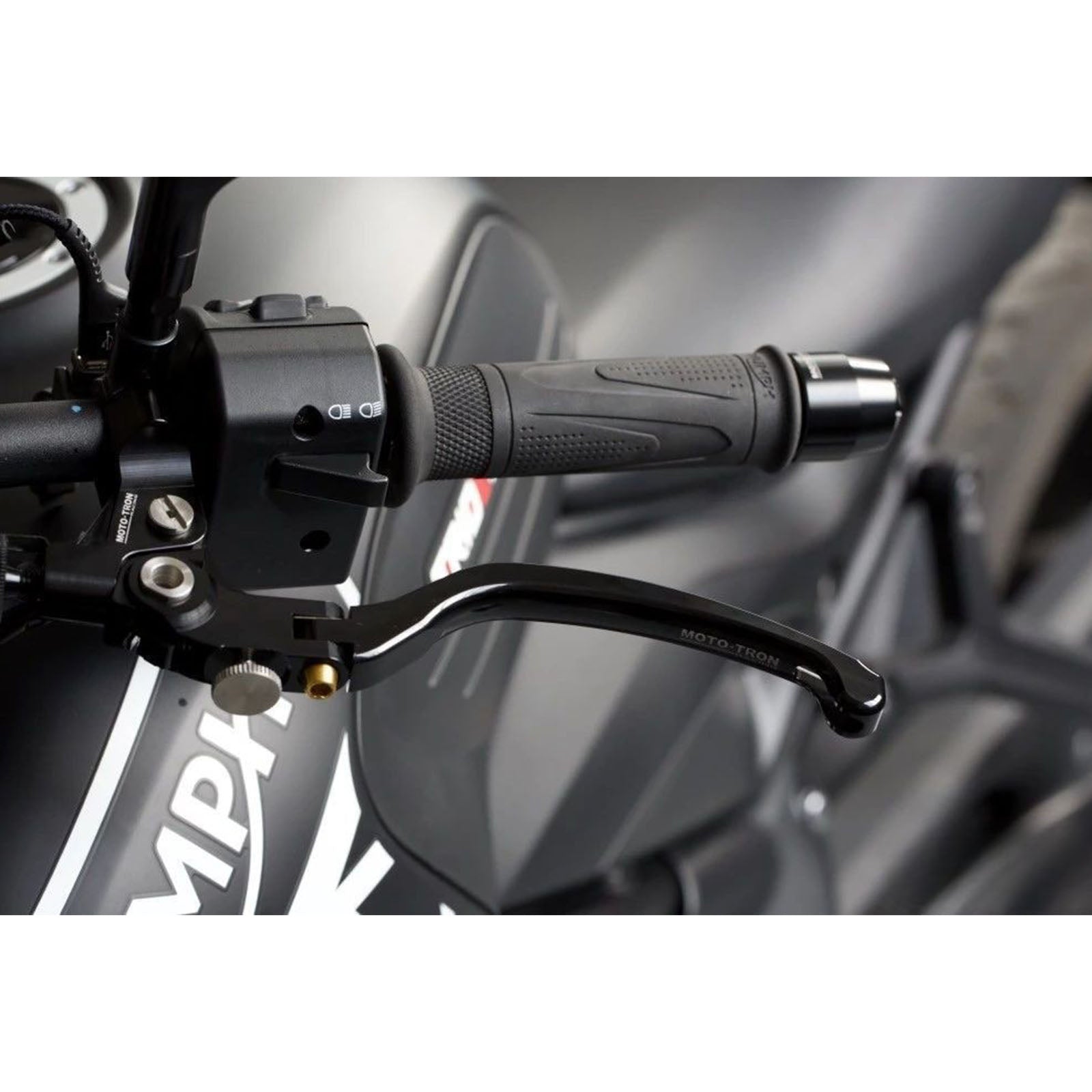 Moto-Tron lightweight racing folding clutch lever installed on Suzuki GSXR, SV650, or GSXS1000 motorcycle for enhanced performance.