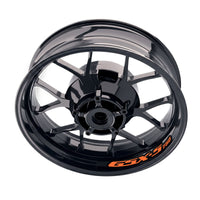 Suzuki GSXS 750 inner rim sticker set by StickerBao, bike model-specific wheel decals with orange and white design on alloy rims.